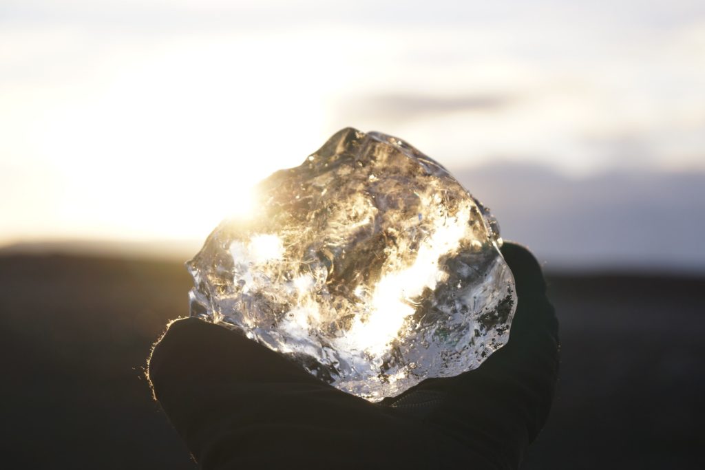 a hand holding a rock
