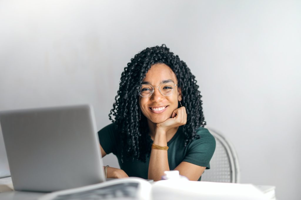 a woman sitting at a desk